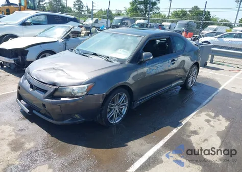 2011 Scion Tc z USA, uszkodzony, nr VIN JTKJF5C75B3011644
